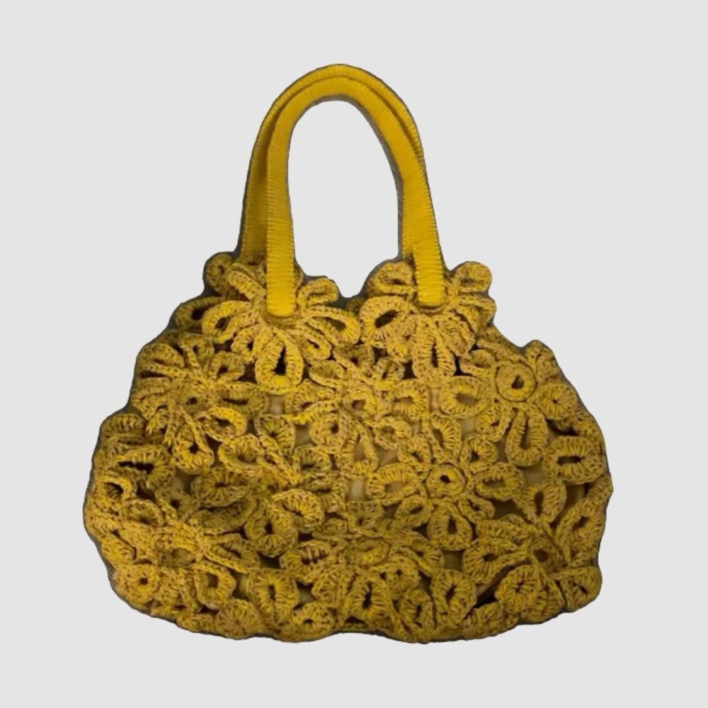 Vintage Stuart Weitzman crochet like bag